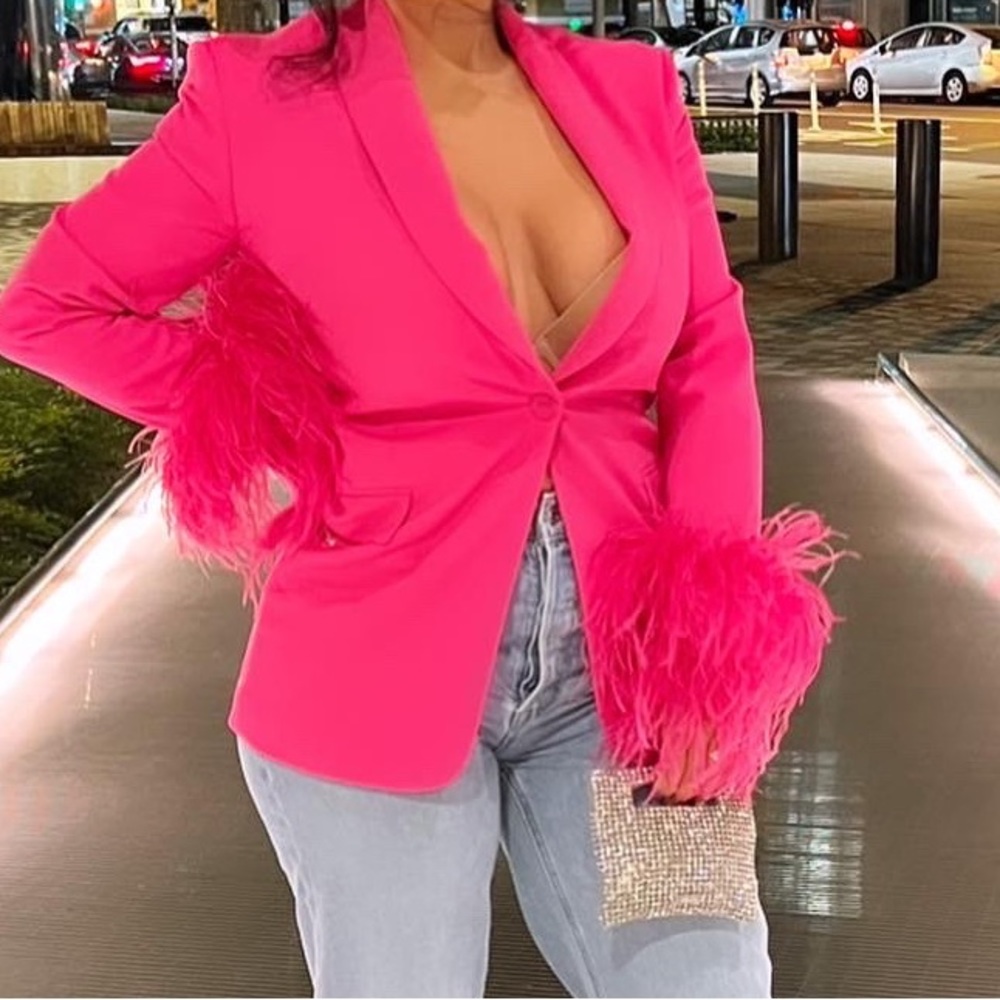 Tailored pink blazer with feather detail